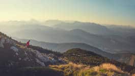 A solitary runner traversing mountain 