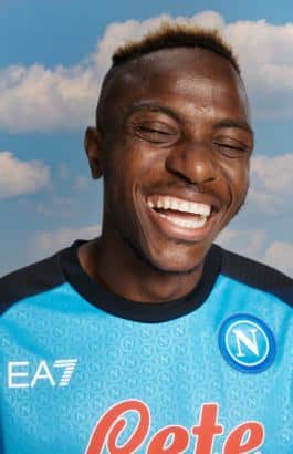 Victor Osimhen is laughing in a Napoli jersey 