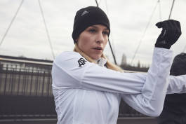 Woman stretching with crossed arms 