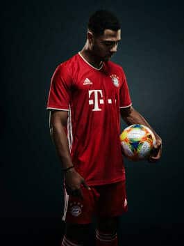 Serge Gnabry Holding Football 